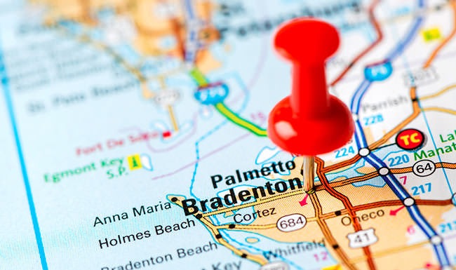 map with pin stuck into the city of Bradenton